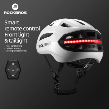 Riding helmet with integrated headlight and tail light